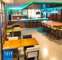 TRYP BY WYNDHAM São Paulo Airport - Hotel de Transito Terminal 3 -Lado Ar - Área restrita á passageiros já embarcados - Piso 1にあるレストランまたは飲食店