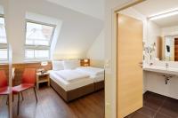 Posteľ alebo postele v izbe v ubytovaní Austria Trend Hotel beim Theresianum Wien