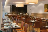 Reštaurácia alebo iné gastronomické zariadenie v ubytovaní Austria Trend Hotel beim Theresianum Wien