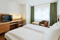 Televízia a/alebo spoločenská miestnosť v ubytovaní Austria Trend Hotel beim Theresianum Wien