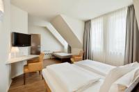 Posteľ alebo postele v izbe v ubytovaní Austria Trend Hotel beim Theresianum Wien