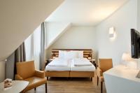 Posteľ alebo postele v izbe v ubytovaní Austria Trend Hotel beim Theresianum Wien