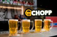 a group of four glasses of beer on a table at Ibis Guaratingueta Aparecida - Circuito da Fé in Guaratinguetá