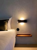 Posteľ alebo postele v izbe v ubytovaní L'authentik petit hôtel LE REFUGE DE MAMIE YO