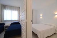 Postel nebo postele na pokoji v ubytování Front Mar - apartamentos