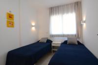 Postel nebo postele na pokoji v ubytování Front Mar - apartamentos
