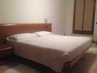 Posteľ alebo postele v izbe v ubytovaní Hotel Scandola