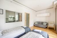 Posteľ alebo postele v izbe v ubytovaní Labo Apartment Ogrodowa