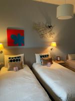 Posteľ alebo postele v izbe v ubytovaní Bigatt Bed & Breakfast