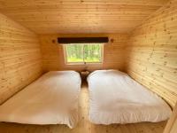 lamp yamanaka-Private Villa for Up to 10 Guests, Free BBQ, Baby-Friendly, 5-Min Drive from Lake Yamanaka, 20-Min Drive from Lake Kawaguchiにあるベッド