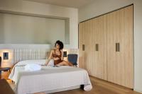 Posteľ alebo postele v izbe v ubytovaní Mima Aparthotel Boutique & Spa