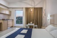 Posteľ alebo postele v izbe v ubytovaní Sea View Hotel & Apartments