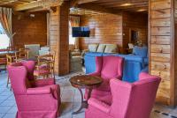 Televízia a/alebo spoločenská miestnosť v ubytovaní Hotel Grèvol Spa