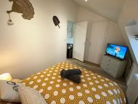 Postel nebo postele na pokoji v ubytov&aacute;n&iacute; LeRelaisdOdile CAMBRAI - HYPER CENTRE - Free Wifi