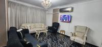 TV a/nebo společenská místnost v ubytování Unique Apartment in Sheraton Heliopolis
