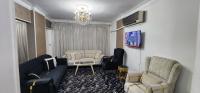 Posezení v ubytování Unique Apartment in Sheraton Heliopolis
