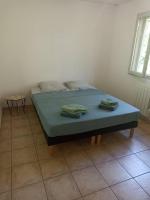 Ein Bett oder Betten in einem Zimmer der Unterkunft Grande villa face &agrave; la plage, superbe vue mer