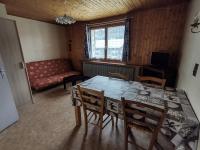 a dining room with a table and chairs and a couch at Appartement Les Gets, 3 pièces, 5 personnes - FR-1-671-25 in Les Gets