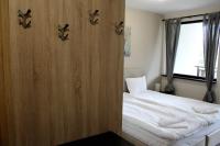 Postel nebo postele na pokoji v ubytování Borovets Gardens Apartments