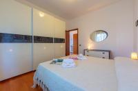 Posteľ alebo postele v izbe v ubytovaní La Rosa Dei Venti Lake View Terrace - Happy Rentals
