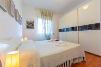 Posteľ alebo postele v izbe v ubytovaní La Rosa Dei Venti Lake View Terrace - Happy Rentals