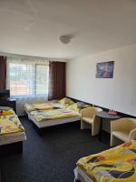 Postel nebo postele na pokoji v ubytování Hotel Buly