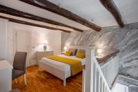 A bed or beds in a room at Enjoy Naples