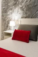 A bed or beds in a room at Enjoy Naples