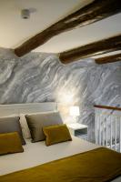 A bed or beds in a room at Enjoy Naples