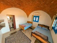 Postel nebo postele na pokoji v ubytování Aladdin Camp