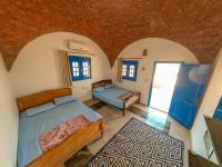 Postel nebo postele na pokoji v ubytování Aladdin Camp