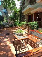 A garden outside Papadioti Apartments