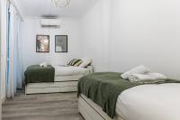 Posteľ alebo postele v izbe v ubytovaní BALEA by SWEET HOME SAN SEBASTIAN