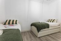 Posteľ alebo postele v izbe v ubytovaní BALEA by SWEET HOME SAN SEBASTIAN