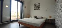 Een bed of bedden in een kamer bij Mini villa Santa Giulia