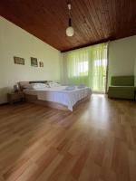 Postel nebo postele na pokoji v ubytování Apartman Mišo