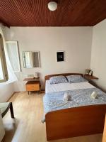 Postel nebo postele na pokoji v ubytování Apartman Mišo