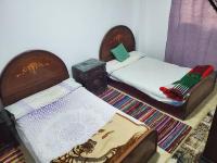 Postel nebo postele na pokoji v ubytování If you love calm this is for you 2 days minimum,air-conditioning FAMILY only please