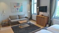 Telewizja i/lub zestaw kina domowego w obiekcie Hotel Diamond Country Club