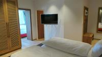 Łóżko lub łóżka w pokoju w obiekcie Hotel Diamond Country Club