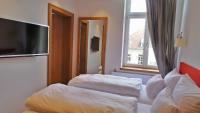 Łóżko lub łóżka w pokoju w obiekcie Hotel Diamond Country Club