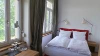 Łóżko lub łóżka w pokoju w obiekcie Hotel Diamond Country Club