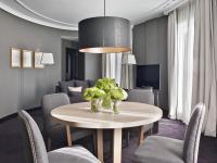 a dining room with a table and chairs at The Principal Madrid, Small Luxury Hotels in Madrid