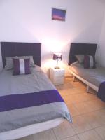Posteľ alebo postele v izbe v ubytovaní Puerto Del Carmen - Apartment 5 - Las Palmeras 3
