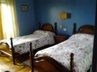 A bed or beds in a room at Hotel Solpor