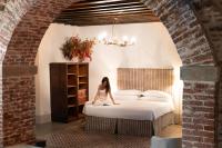 Posteľ alebo postele v izbe v ubytovaní Castello di Buttrio