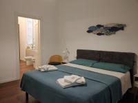 A bed or beds in a room at Maisonvanilla