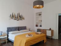 A bed or beds in a room at Maisonvanilla