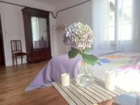 Łóżko lub łóżka w pokoju w obiekcie Maison Violette en Berry