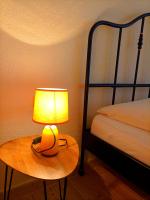Postel nebo postele na pokoji v ubytování Apartmani Sabina